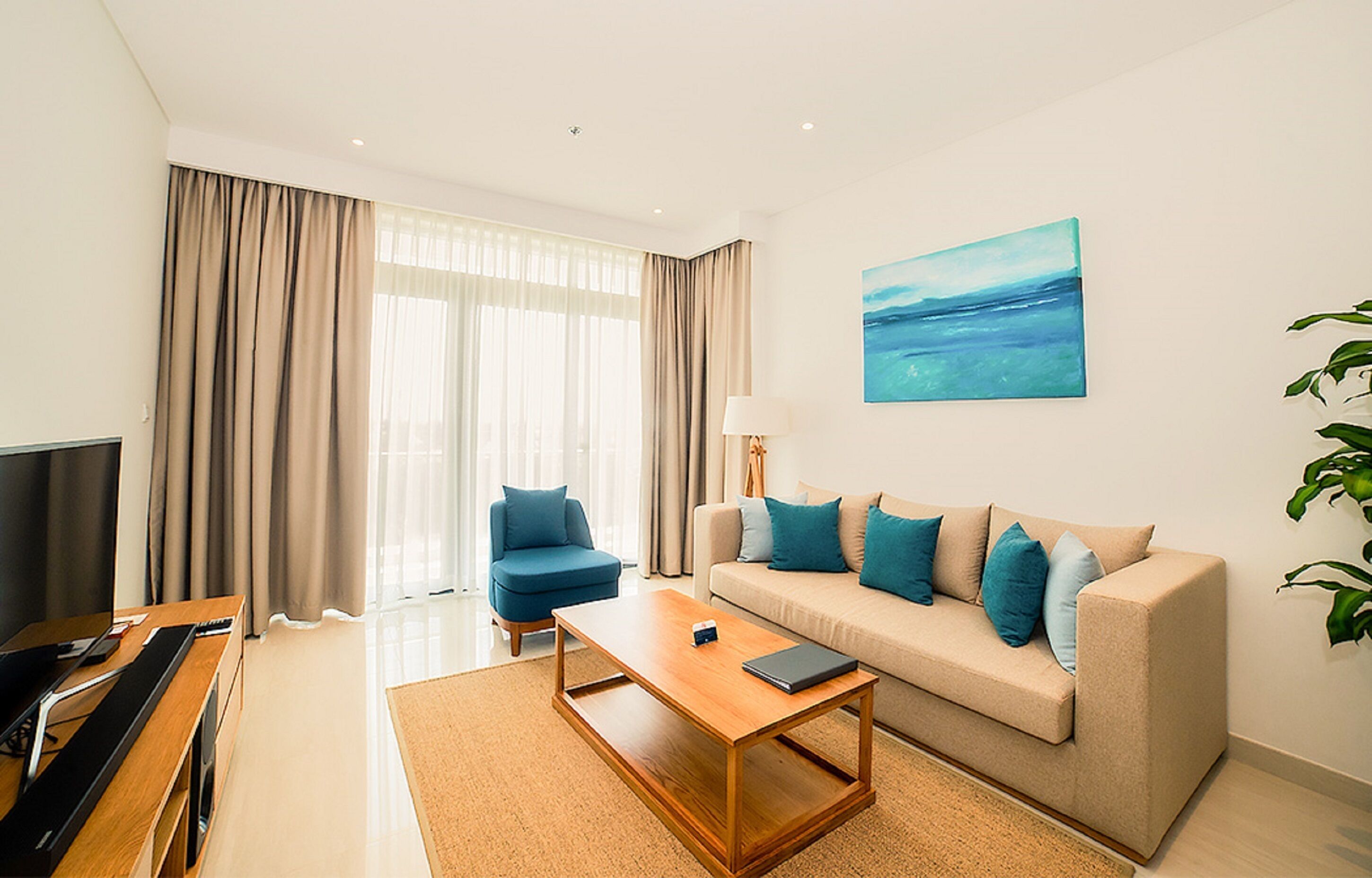 2 bedrooms apartment | living room | lcd tv, dvd player