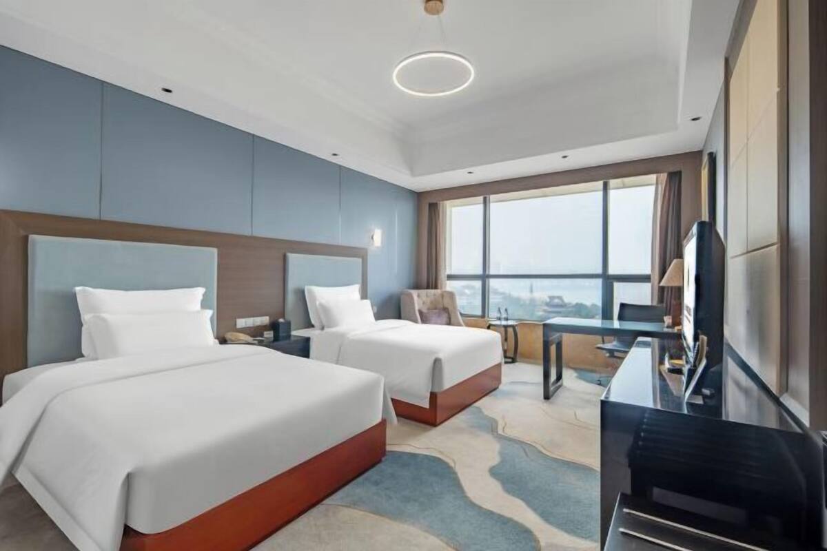 Desk, blackout drapes, iron/ironing board, free cribs/infant beds