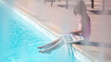 Seasonal outdoor pool, sun loungers, lifeguards on site