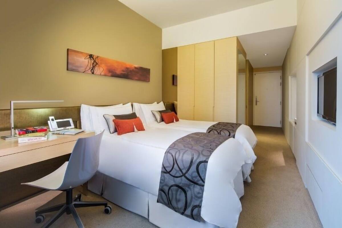 Deluxe Double or Twin Room | Minibar, in-room safe, desk, laptop workspace