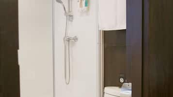 Shower, hair dryer, slippers, towels