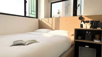 Desk, blackout curtains, free WiFi, bed sheets