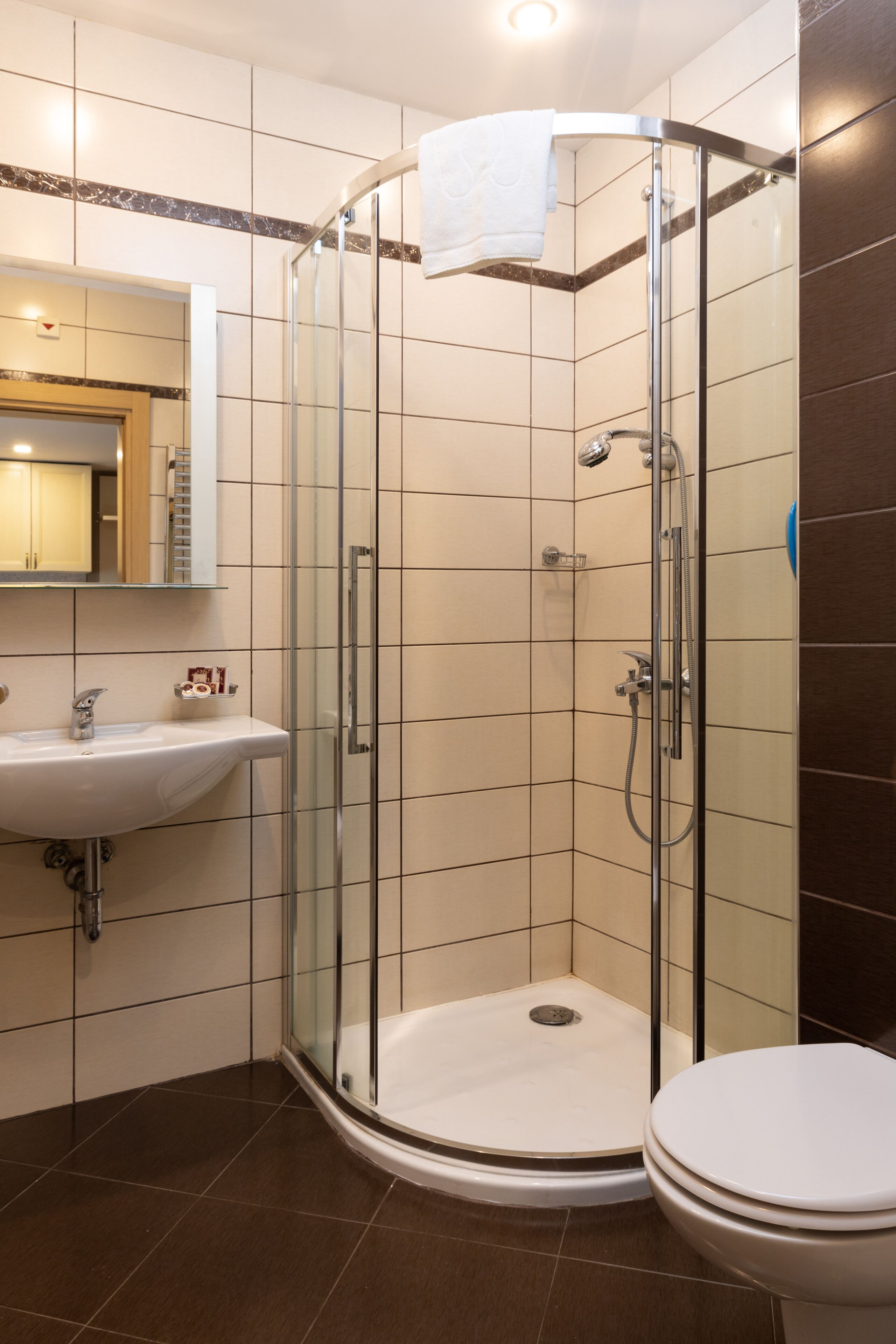 studio | bathroom | shower, designer toiletries, hair dryer, towels