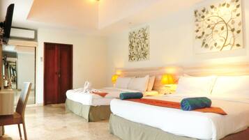 Ropa de cama de alta calidad, minibar, caja fuerte y escritorio