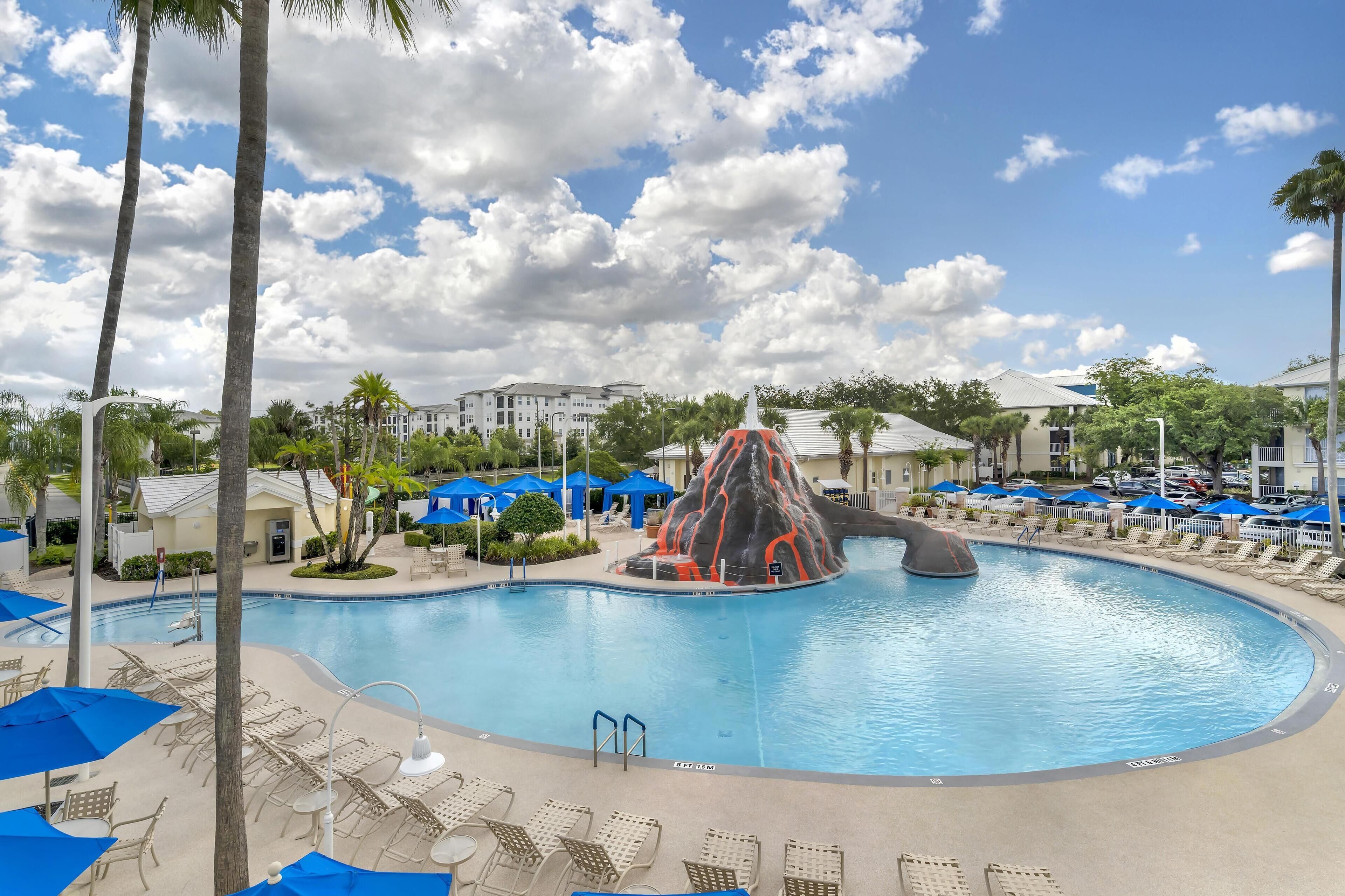 Outdoor pool, open 7:00 AM to 11:00 PM, pool umbrellas, pool loungers