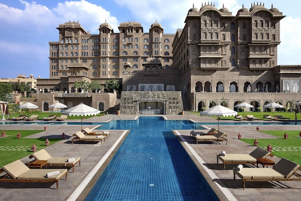 Outdoor pool, pool umbrellas, pool loungers
