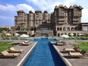 Outdoor pool, pool umbrellas, pool loungers