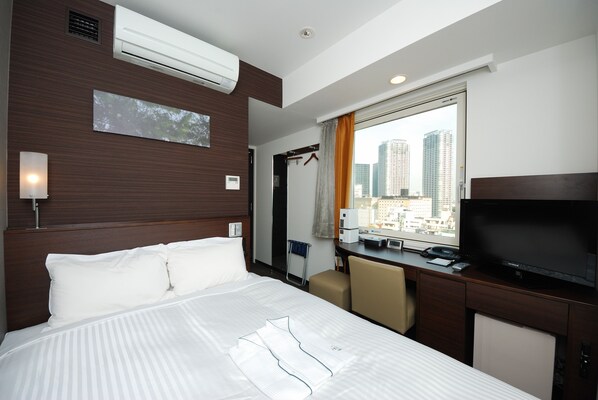 Desk, blackout curtains, soundproofing, iron/ironing board