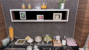 A breakfast buffet with various food items, condiments, and beverages. - Sotetsu Fresa Inn Hamamatsucho Daimon (Tokyo)