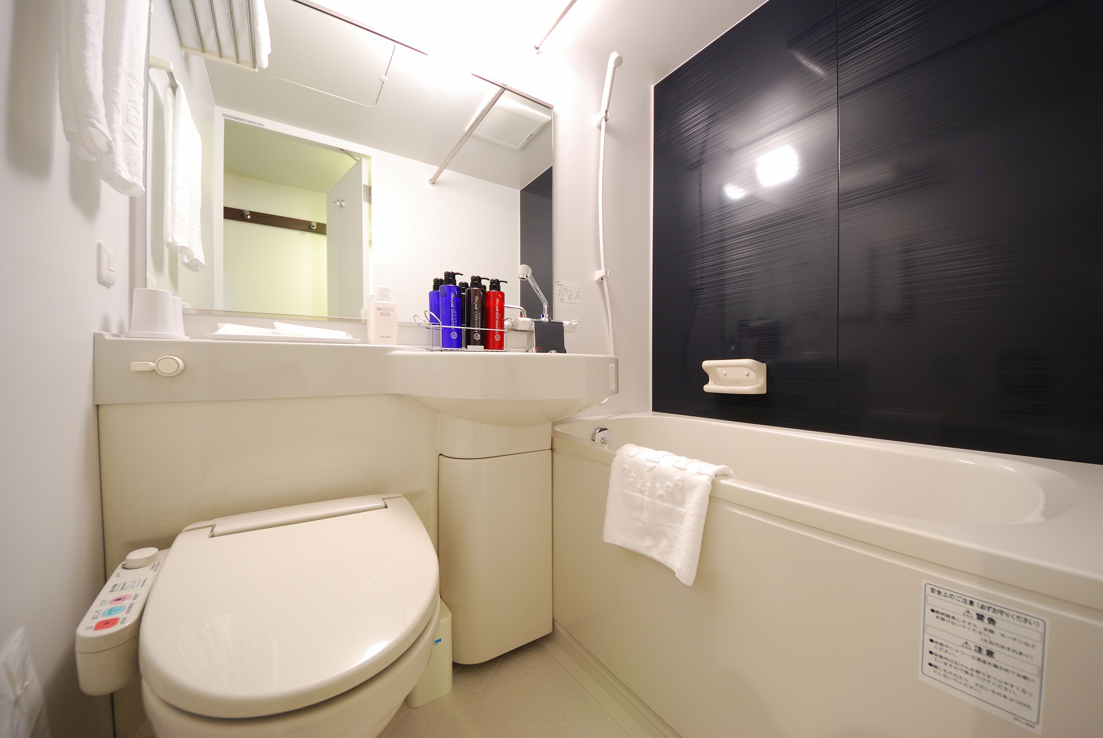 free toiletries, hair dryer, slippers, electronic bidet