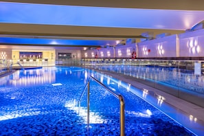 Outdoor pool, pool loungers, lifeguards on site