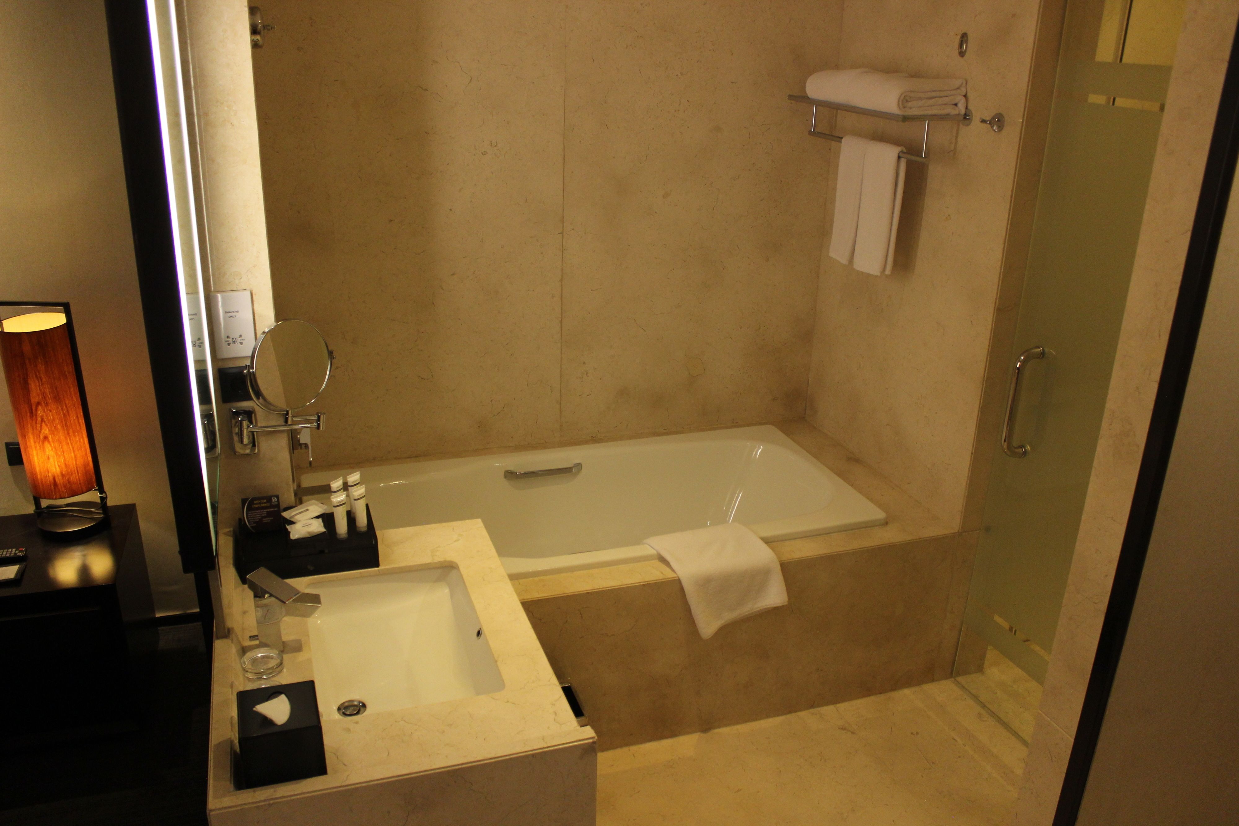 separate bathtub and shower, deep-soaking bathtub, rainfall showerhead