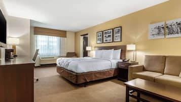 Hypo-allergenic bedding, desk, laptop workspace, blackout curtains