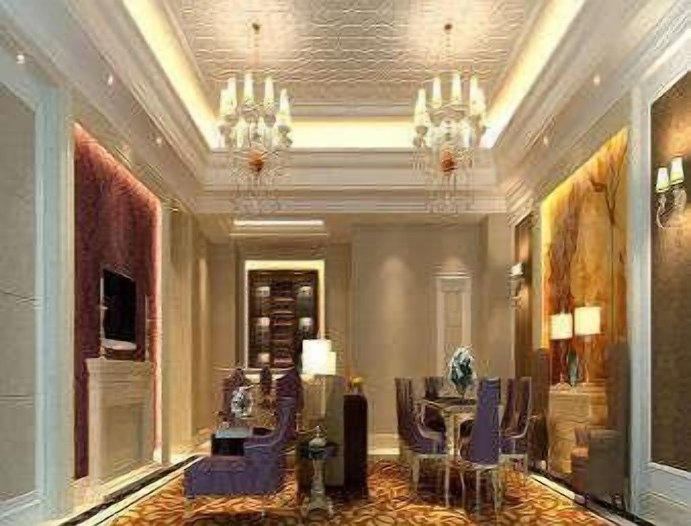 A luxurious hotel lobby with a grand chandelier, plush seating, and a classic decor style.