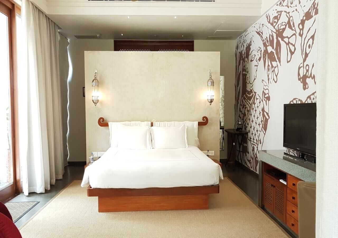 Deluxe Room, 1 King Bed (Plunge Pool) | Minibar, in-room safe, desk, laptop workspace
