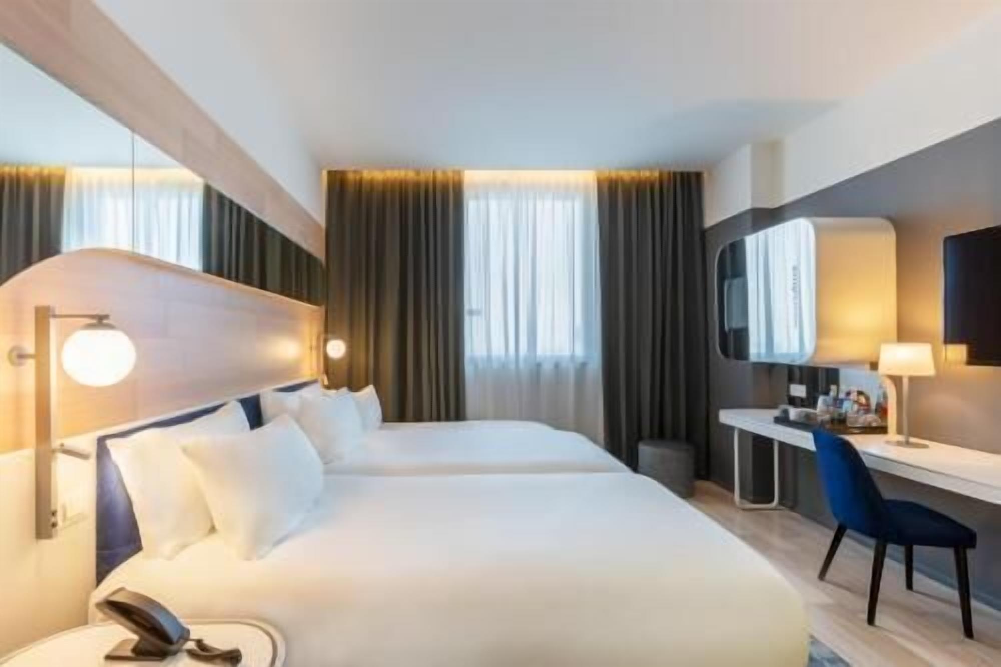 Premium bedding, down comforters, minibar, in-room safe