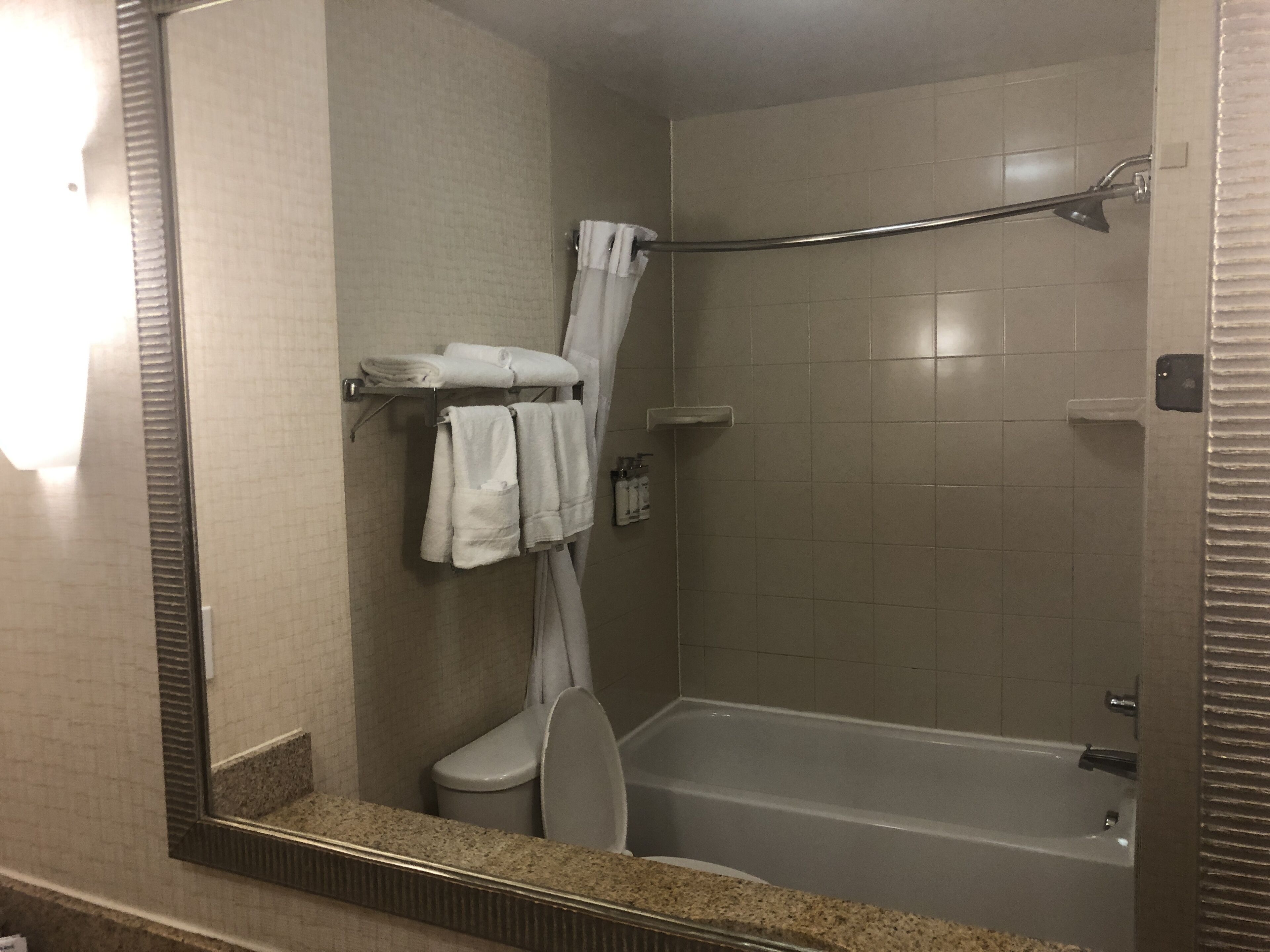 combined shower/bathtub, hair dryer, towels