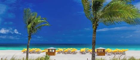 On the beach, beach cabanas, sun-loungers, beach umbrellas