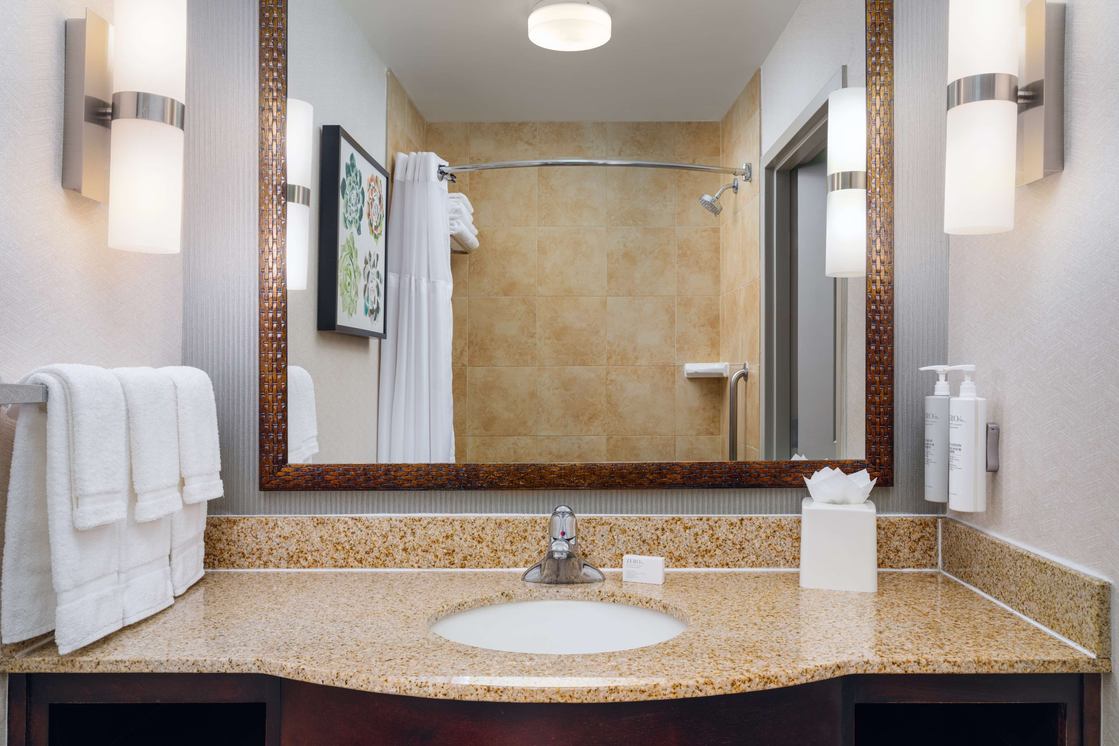 room, 2 queen beds | bathroom | free toiletries, hair dryer, dressing gowns, towels