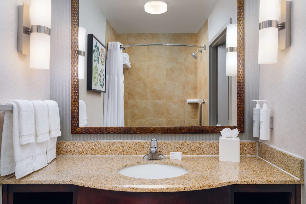 room, 2 queen beds | bathroom | free toiletries, hair dryer, dressing gowns, towels