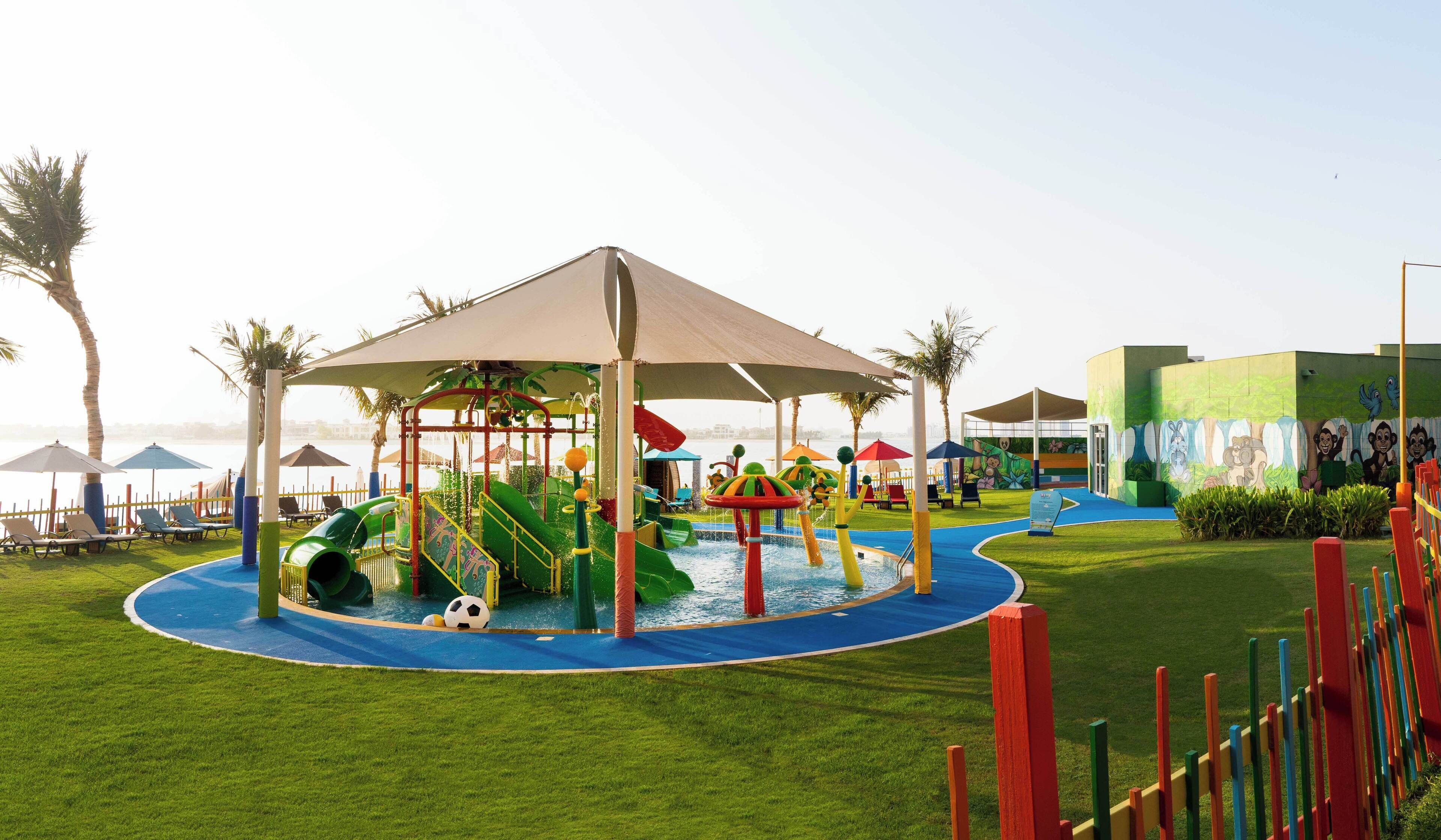 2 outdoor pools, pool umbrellas, pool loungers