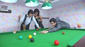 Enjoy a game of pool in this room with a billiards table and plenty of space to play.