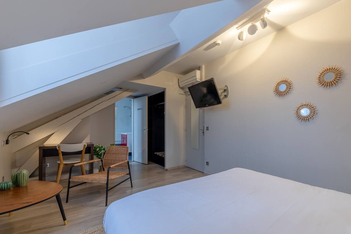 Premium bedding, memory foam beds, desk, laptop workspace