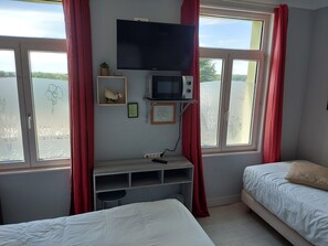 Habitación Confort | Ropa de cama de alta calidad y minibar 