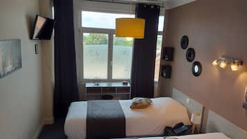 Ropa de cama de alta calidad, minibar, caja fuerte y escritorio