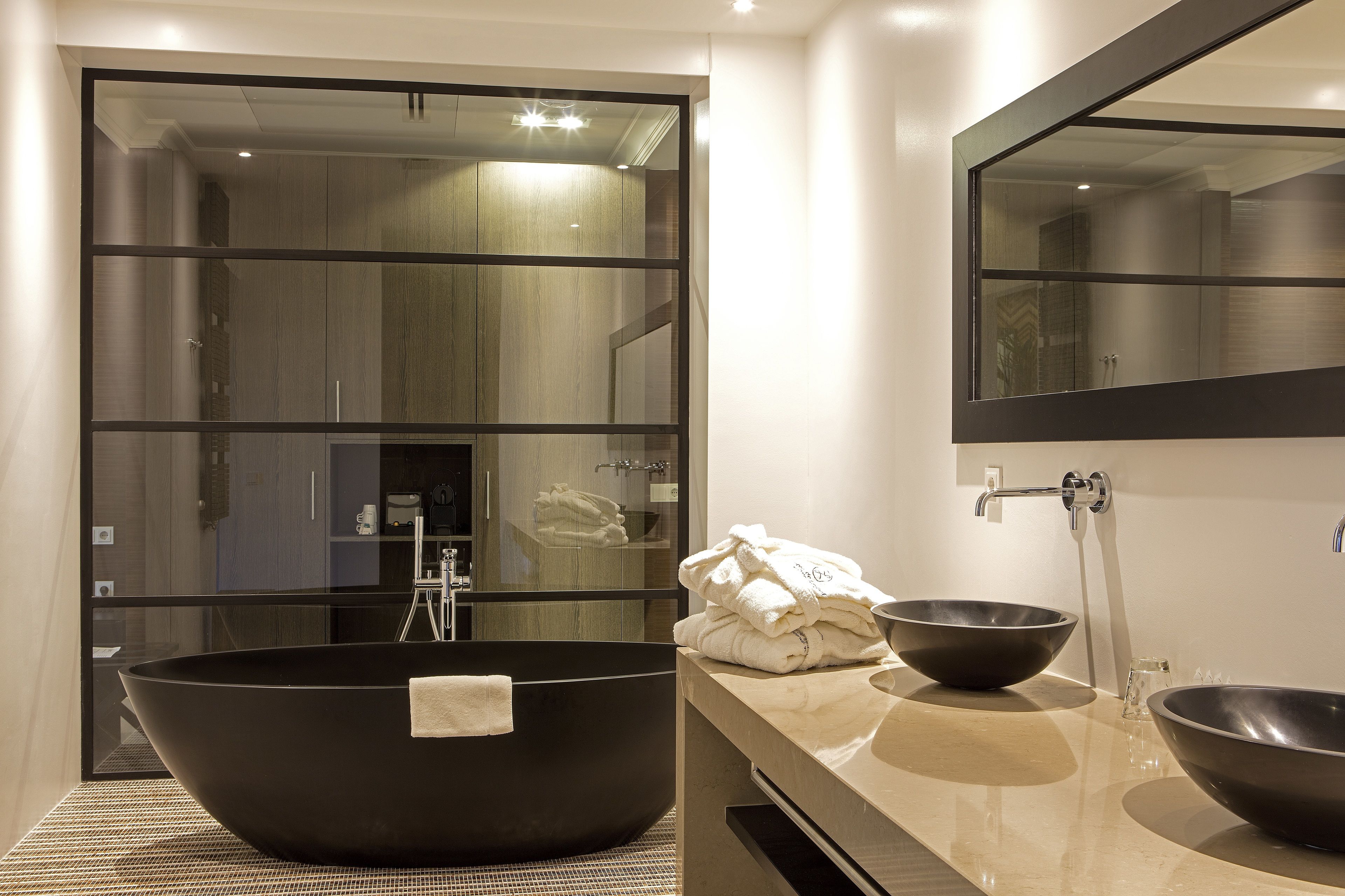 master suite | bathroom | shower, rainfall showerhead, designer toiletries, hair dryer