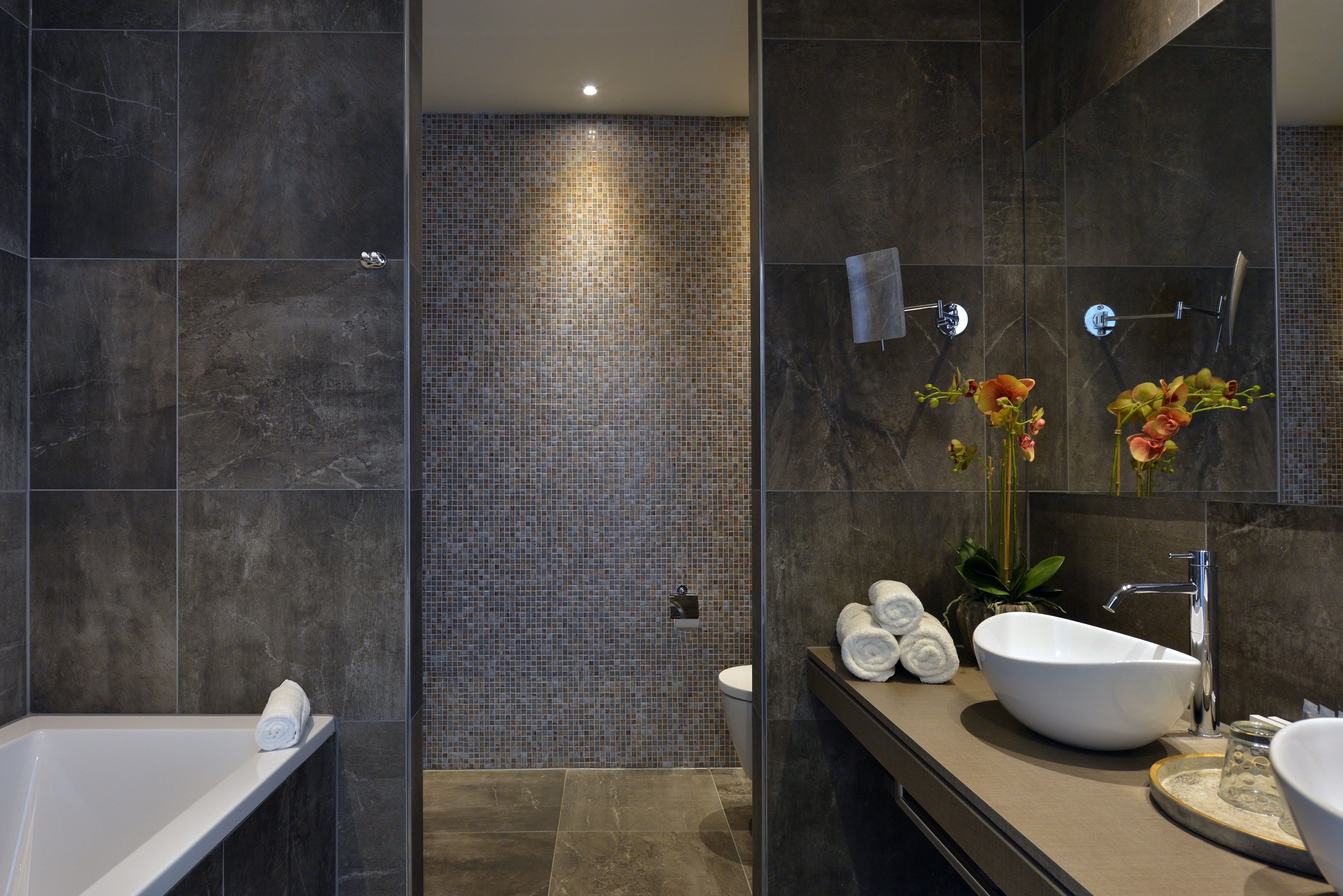 junior suite | bathroom | shower, rainfall showerhead, designer toiletries, hair dryer