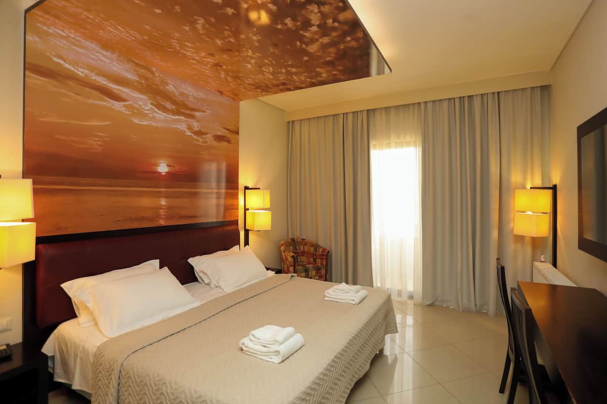 Habitación doble Deluxe, vista al mar | 1 habitación, ropa de cama de alta calidad y camas Select Comfort