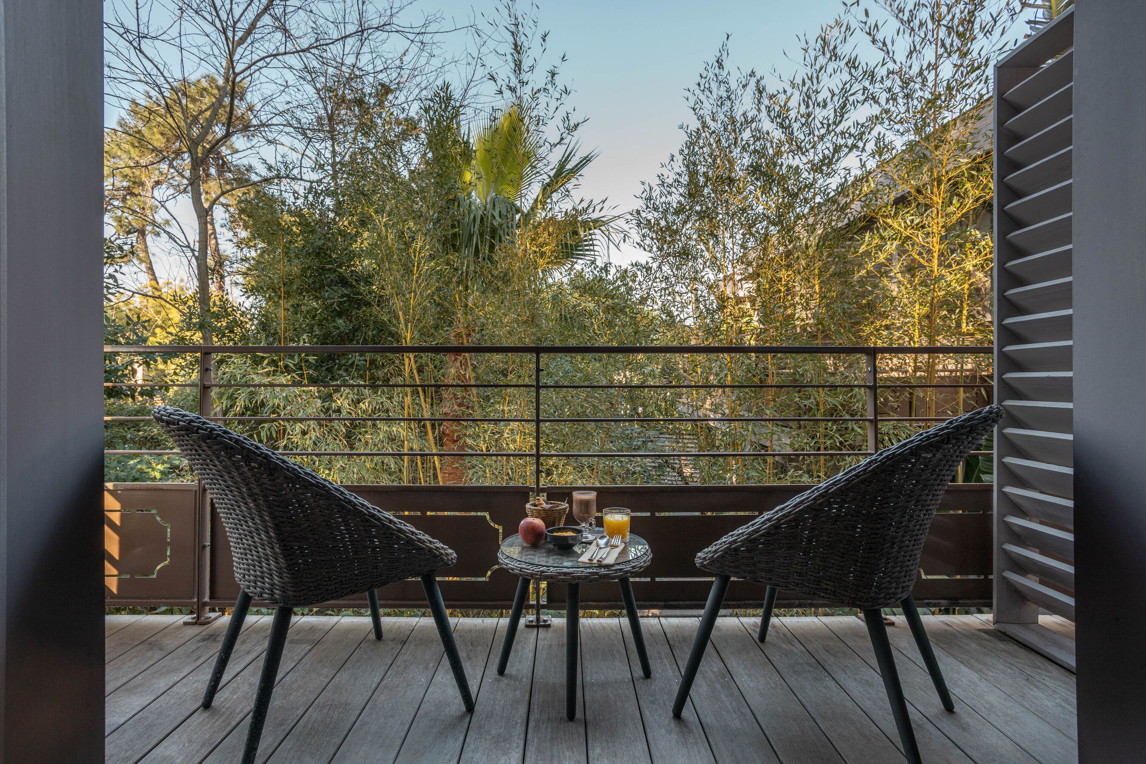 cocoon room with garden view | premium bedding, minibar, in-room safe, desk