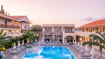 Seasonal outdoor pool, pool umbrellas, pool loungers