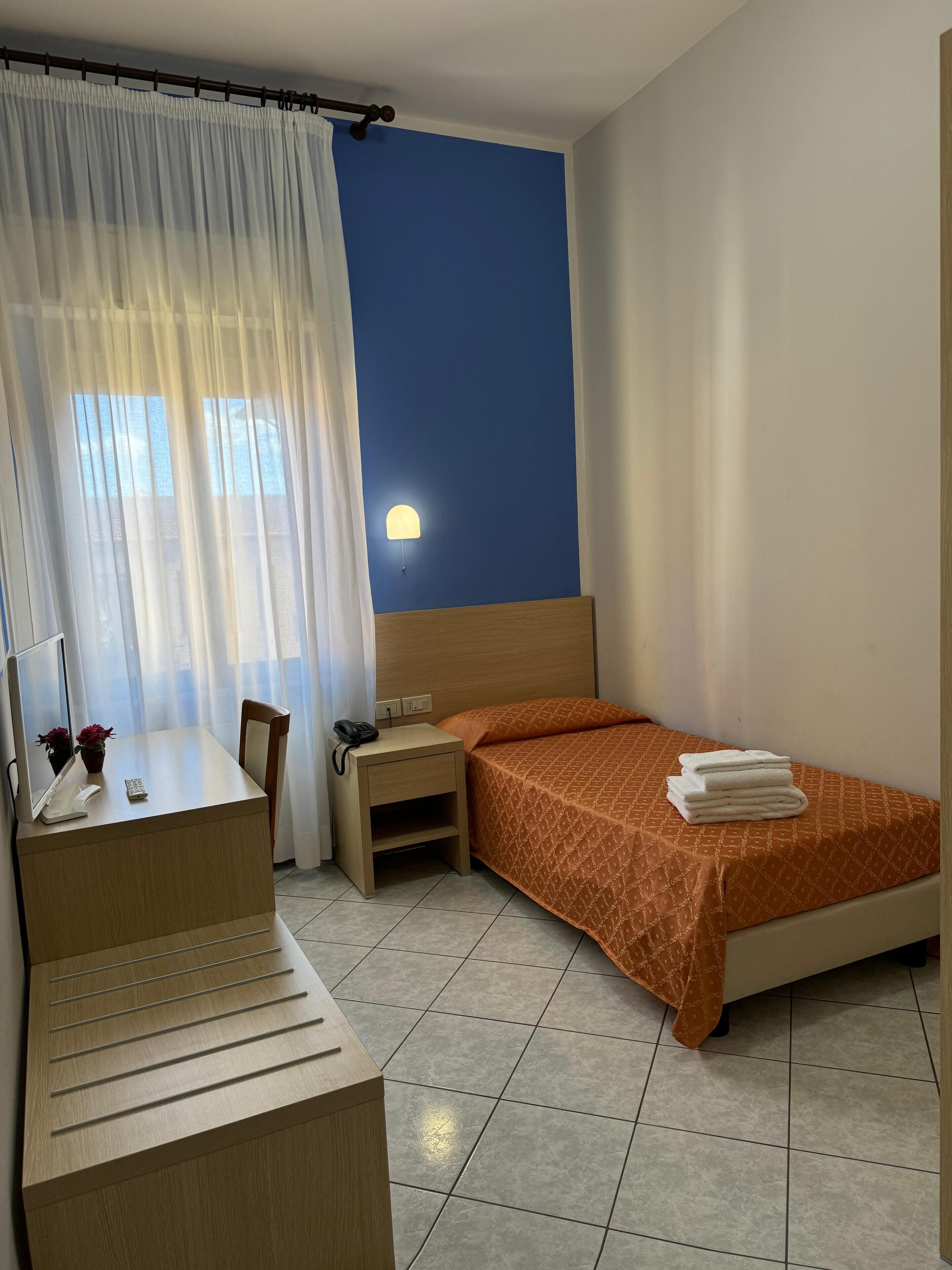 single room | frette italian sheets, select comfort beds, in-room safe