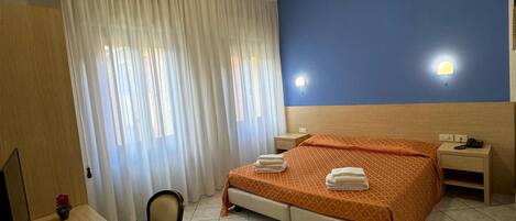 Frette Italian sheets, Select Comfort beds, in-room safe