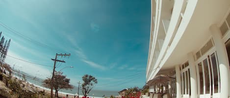 On the beach, sun loungers, beach umbrellas, beach towels