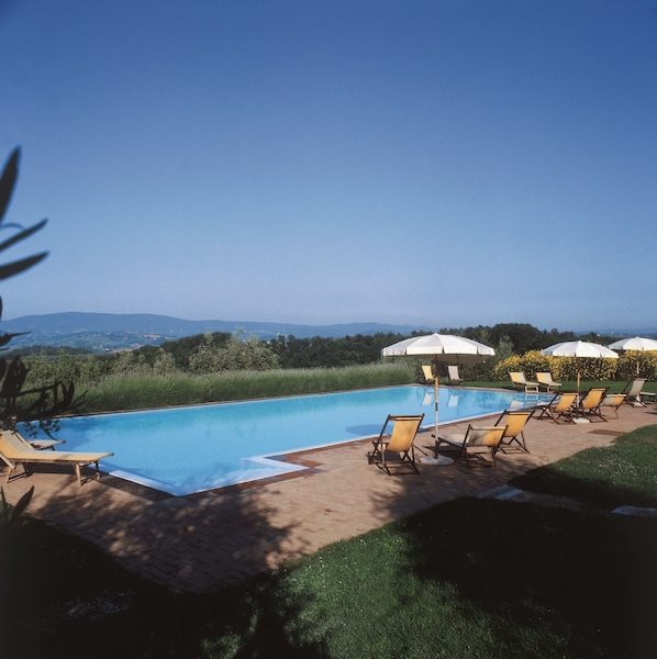 Outdoor pool, pool umbrellas, pool loungers