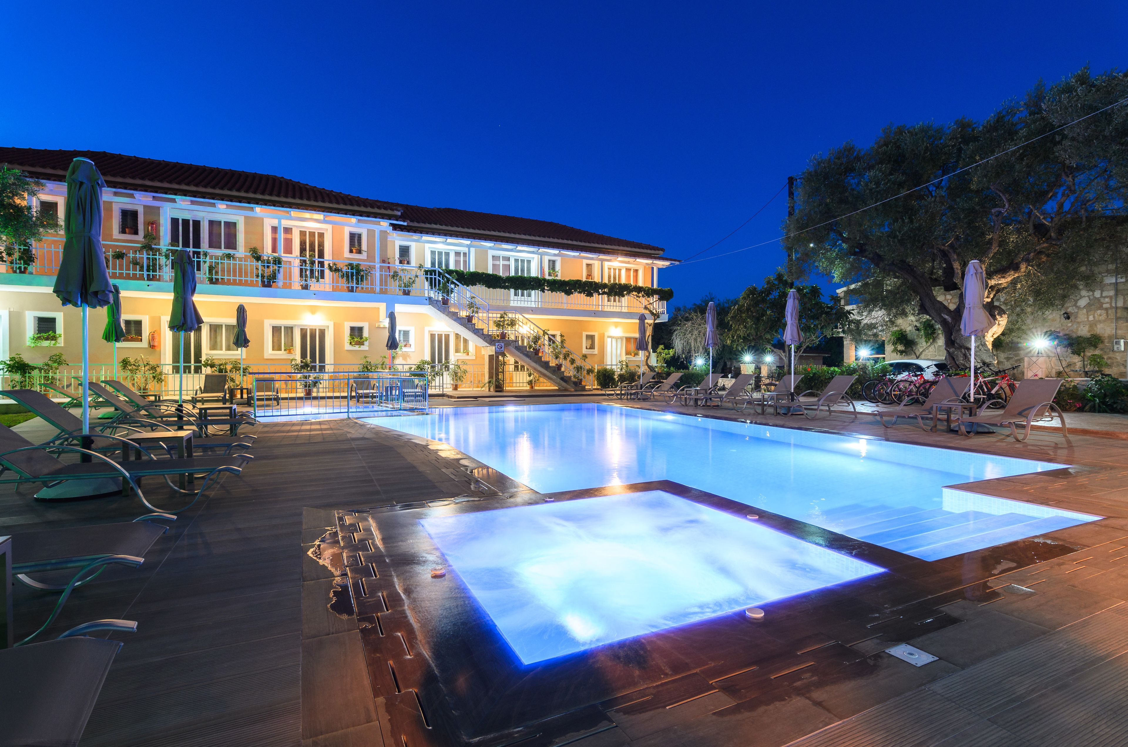 seasonal outdoor pool, pool umbrellas, pool loungers