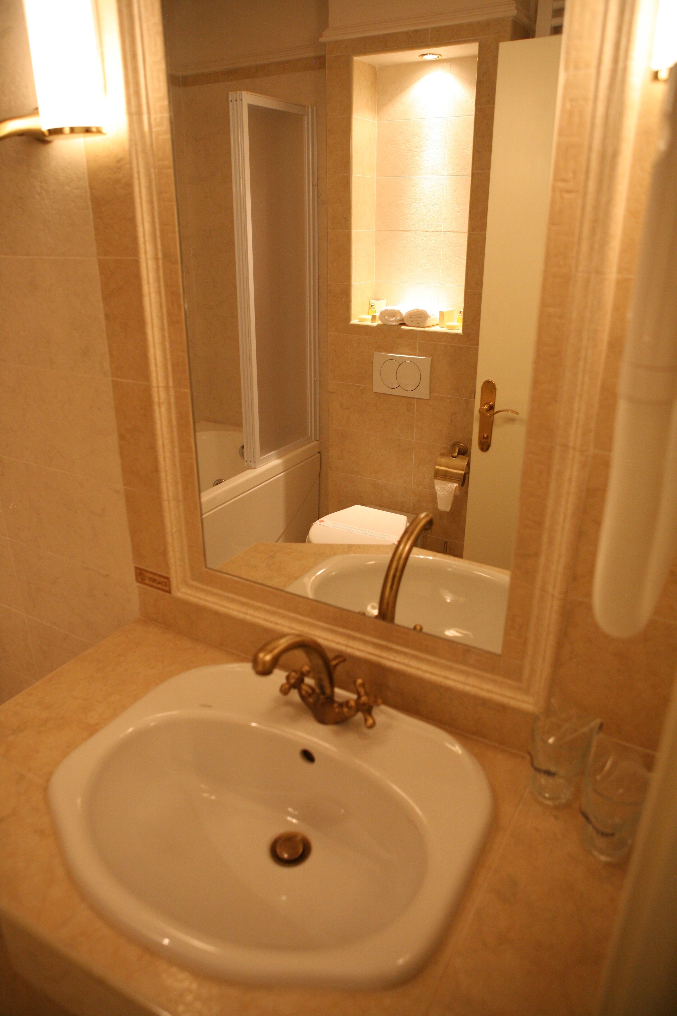 standard apartment, 1 bedroom | bathroom | designer toiletries, hair dryer, slippers, towels