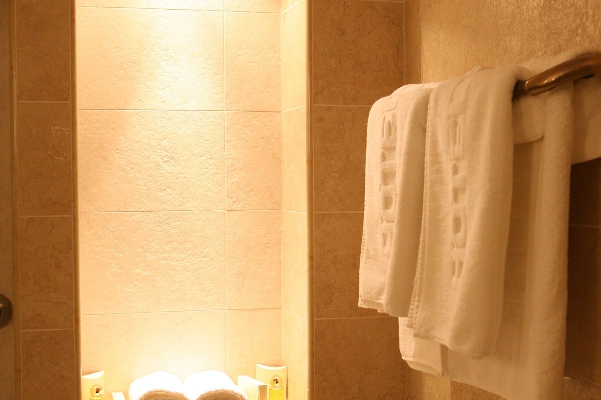 standard apartment, 2 bedrooms | bathroom | designer toiletries, hair dryer, slippers, towels