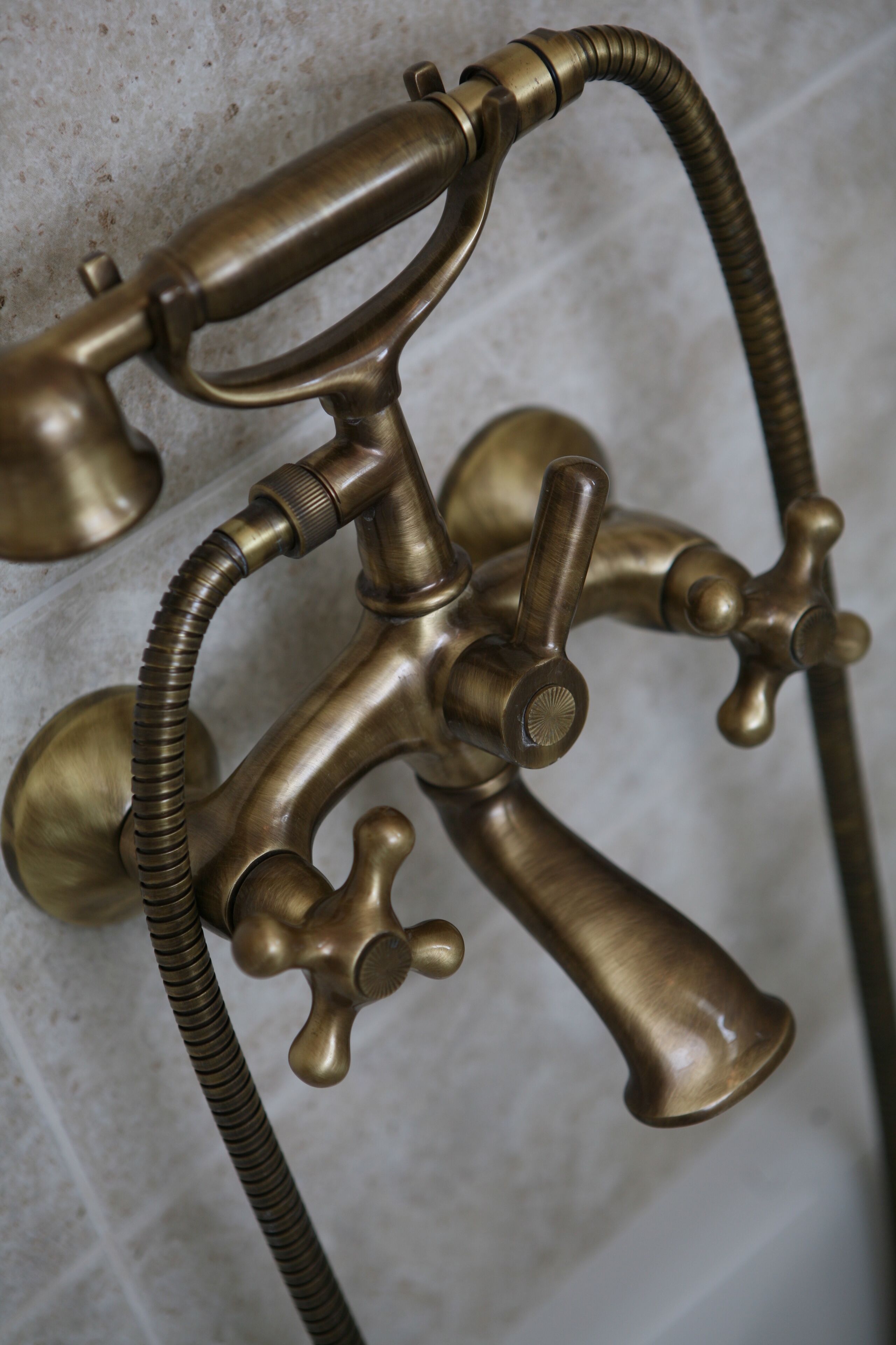 designer toiletries, hair dryer, slippers, towels