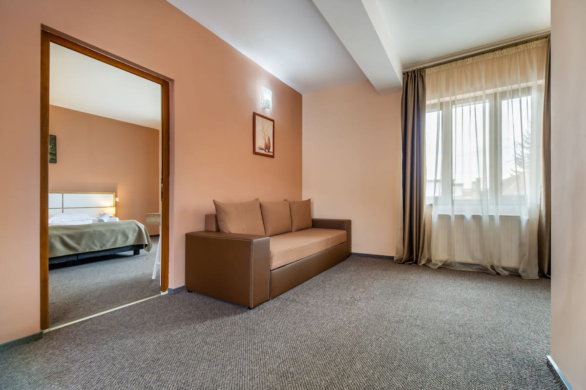 Standard Apartment | Minibar, in-room safe, soundproofing, iron/ironing board