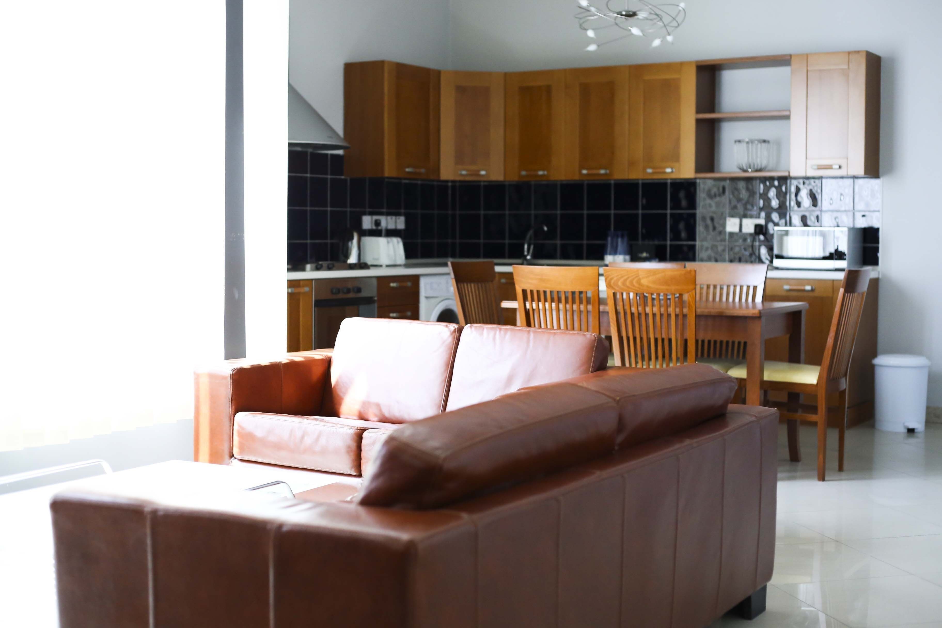 apartment, 2 bedrooms, partial ocean view | minibar, in-room safe, desk, laptop workspace