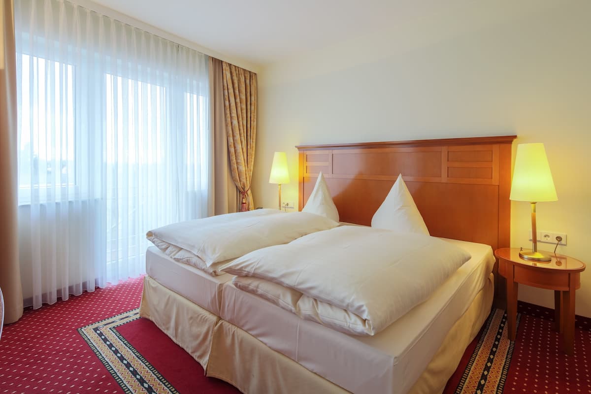 1 habitación, ropa de cama de alta calidad y minibar