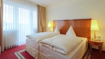 Ropa de cama de alta calidad y minibar