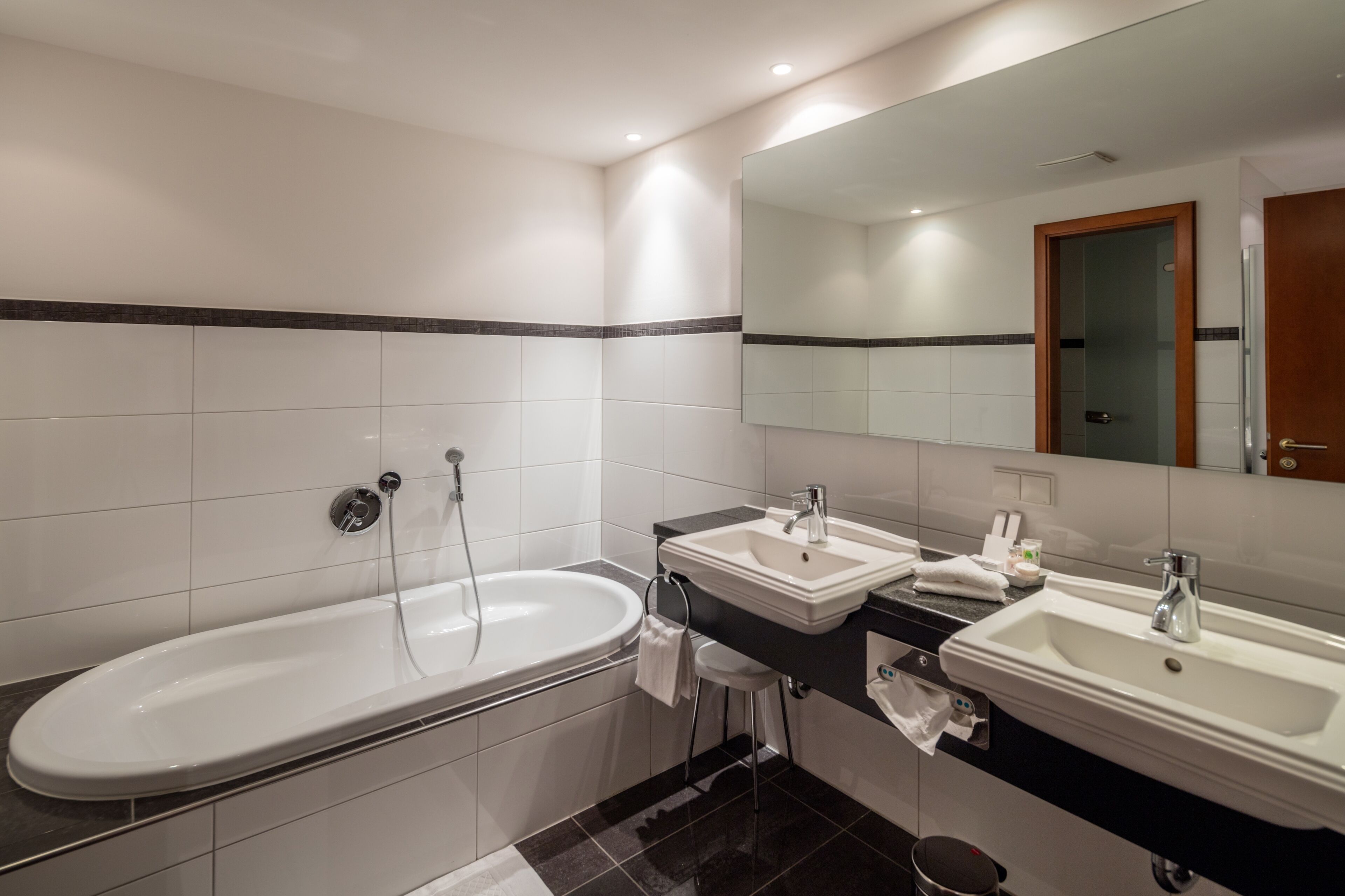 deep-soaking bathtub, free toiletries, hair dryer, bathrobes