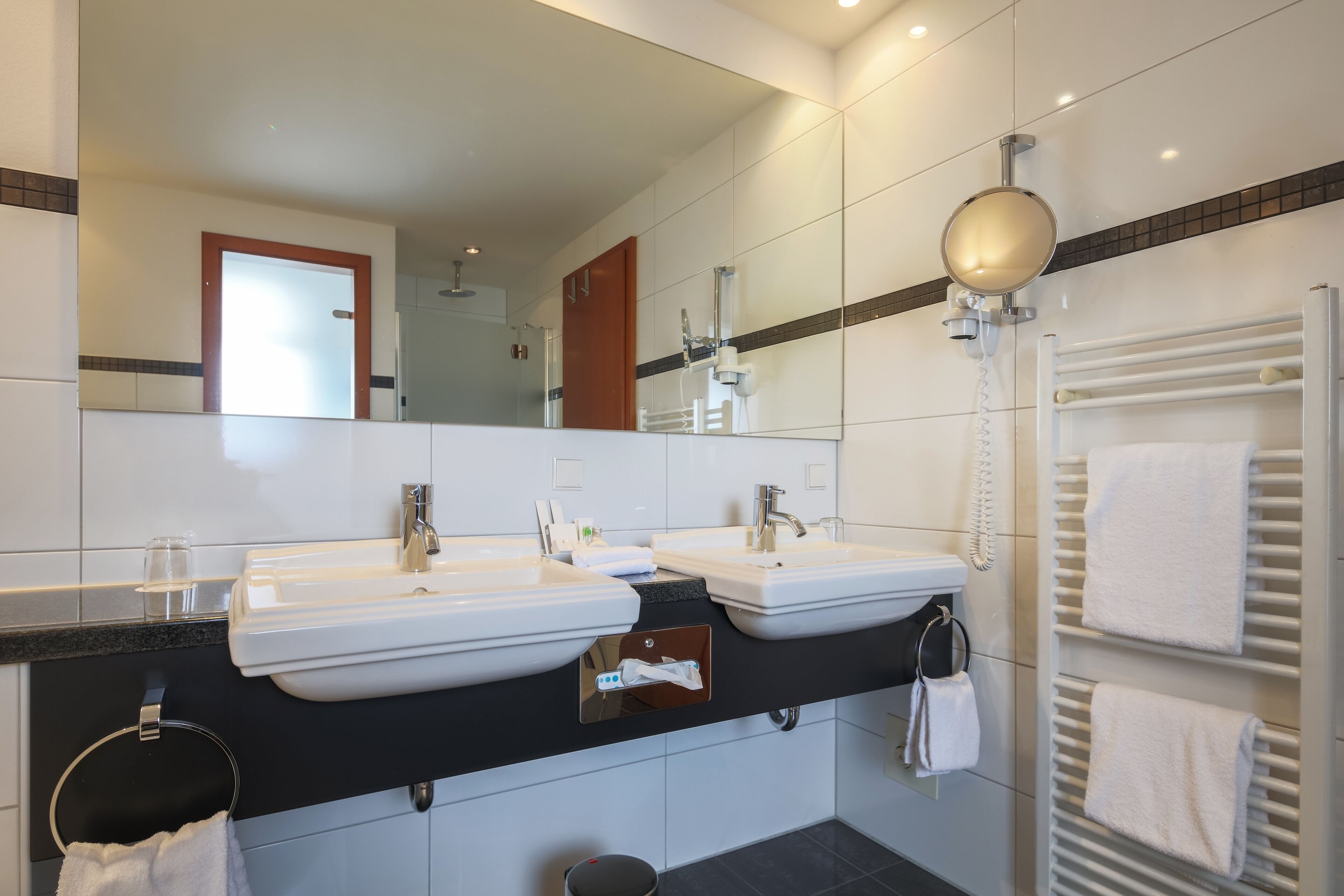 deep-soaking bathtub, free toiletries, hair dryer, bathrobes