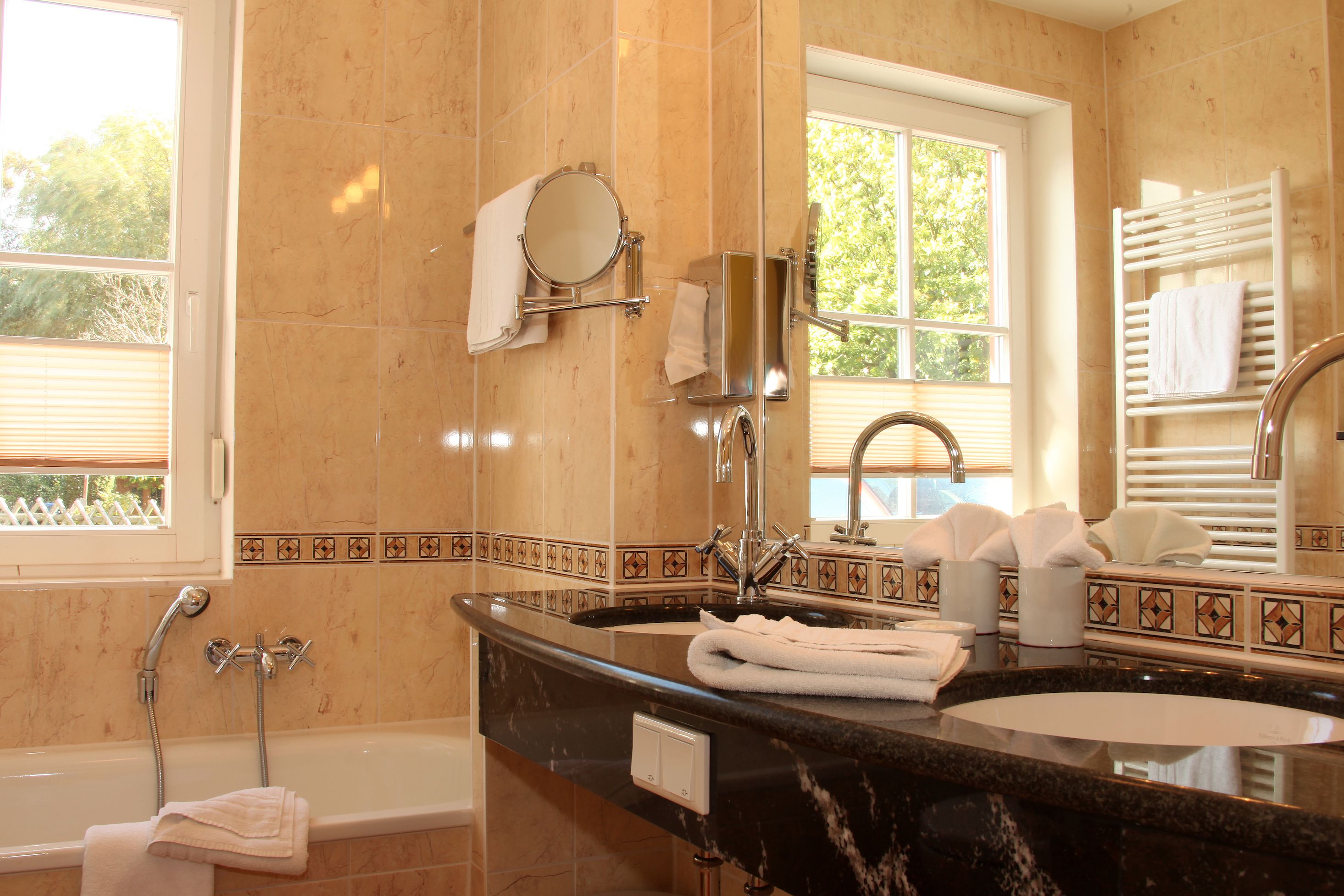 rainfall showerhead, hair dryer, towels