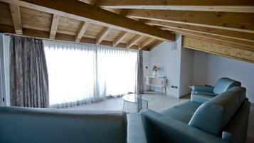 Suite | Area soggiorno | TV LED, film pay-per-view